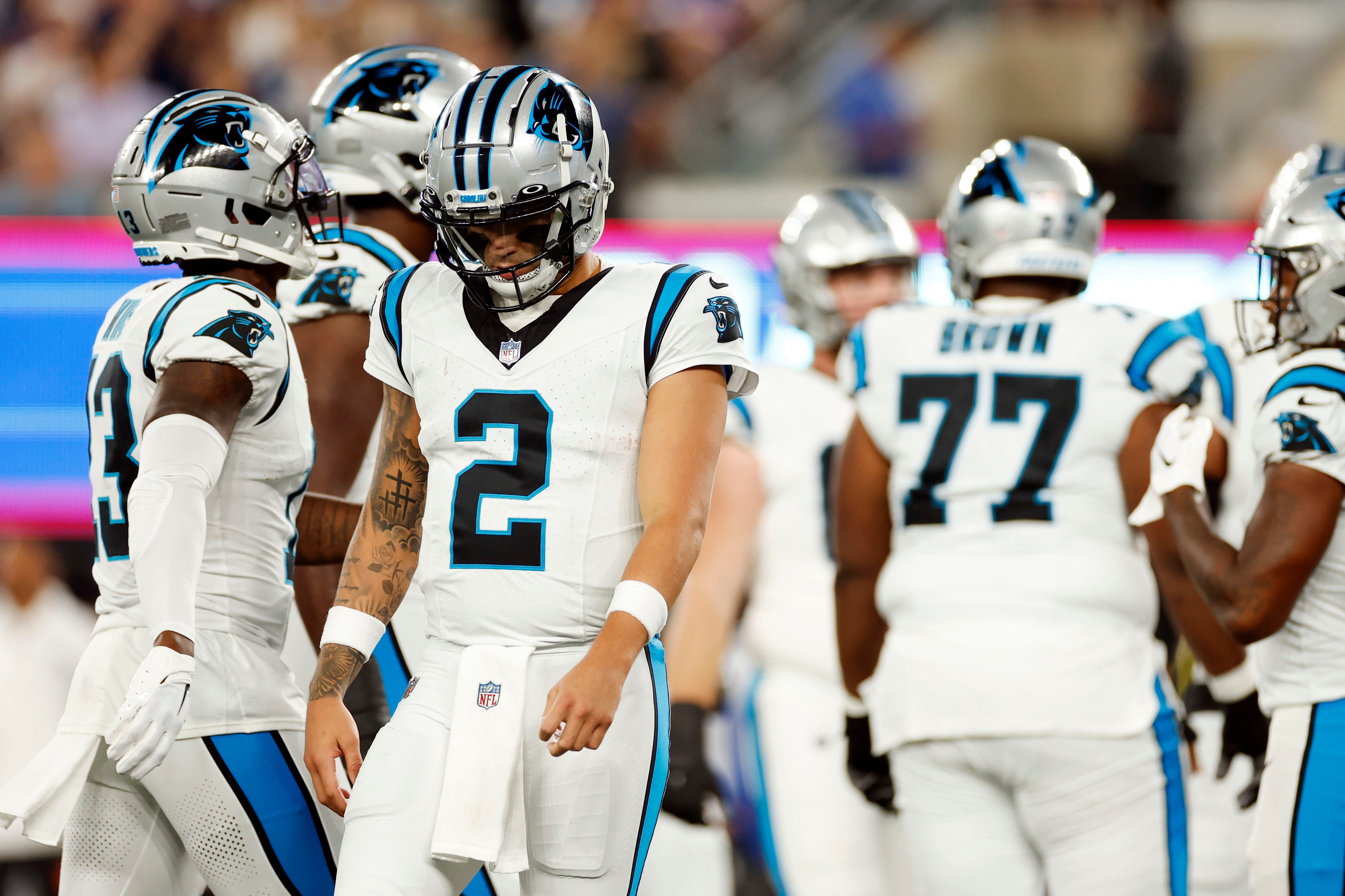 Aug. 13, 2011 - Charlotte, North Carolina, U.S - Carolina Panthers Top Cats  performs during a timeout as it continues to rain at tonights game between  the Panthers and the Giants.Panthers defeat