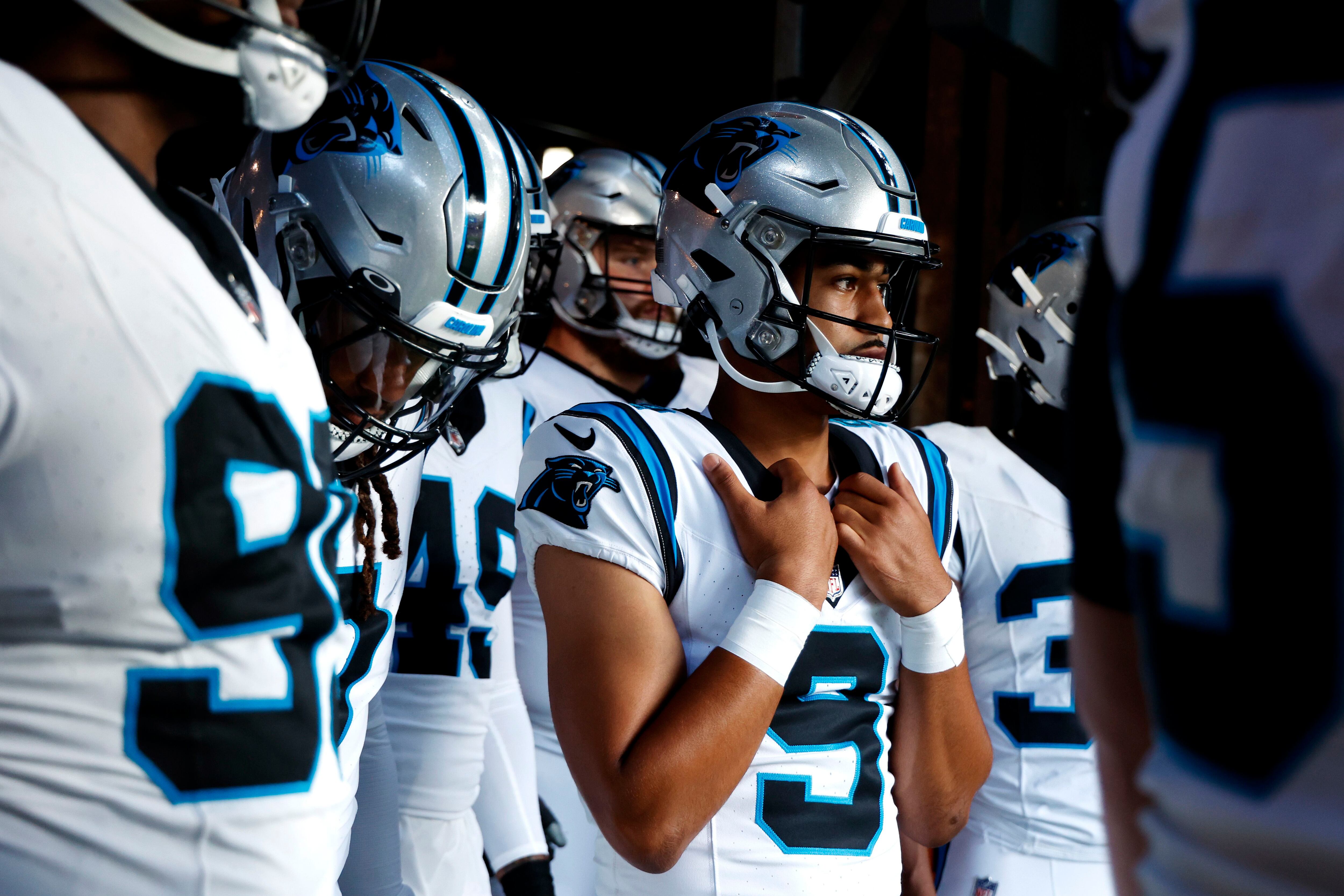 Carolina Panthers quarterback P.J. Walker (6) runs off the field against  the New York Giants during an NFL football game, Sunday, Oct. 24, 2021, in  East Rutherford, N.J. (AP Photo/Adam Hunger Stock