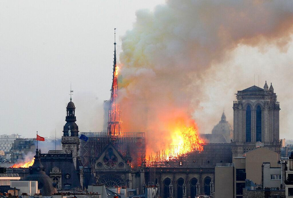 New golden rooster weathervane installed atop Notre Dame Cathedral spire -  CBS News