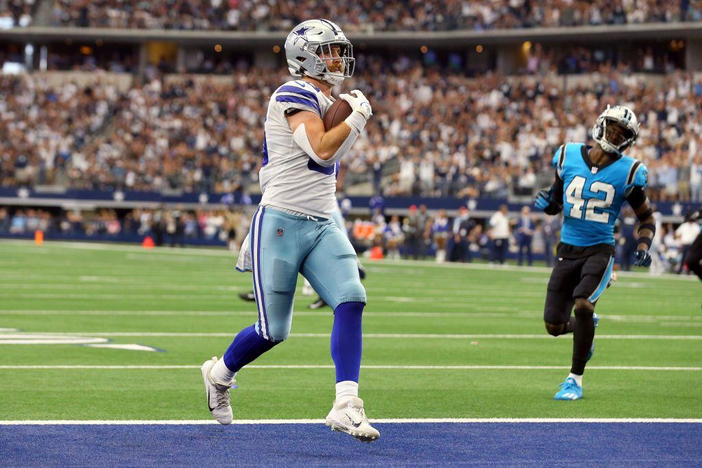 Elliott, Cowboys run over top defense, beat Panthers 36-28