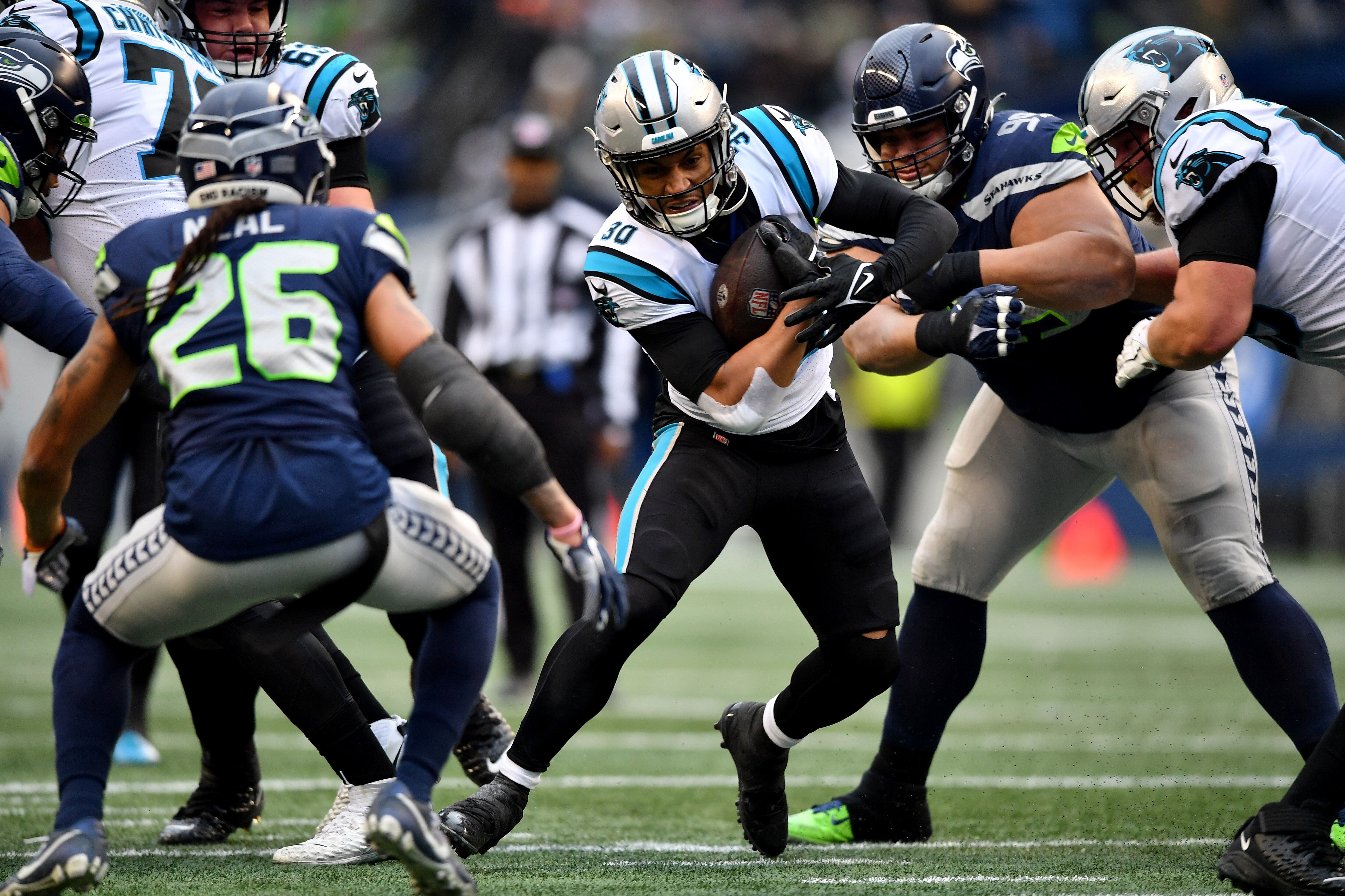 Panthers run over and through Seahawks for 30-24 victory