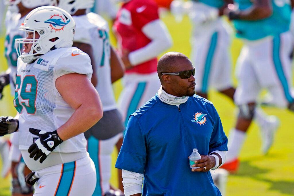 Fired Miami Dolphins coach sues NFL, alleging racist hiring - Boston News,  Weather, Sports