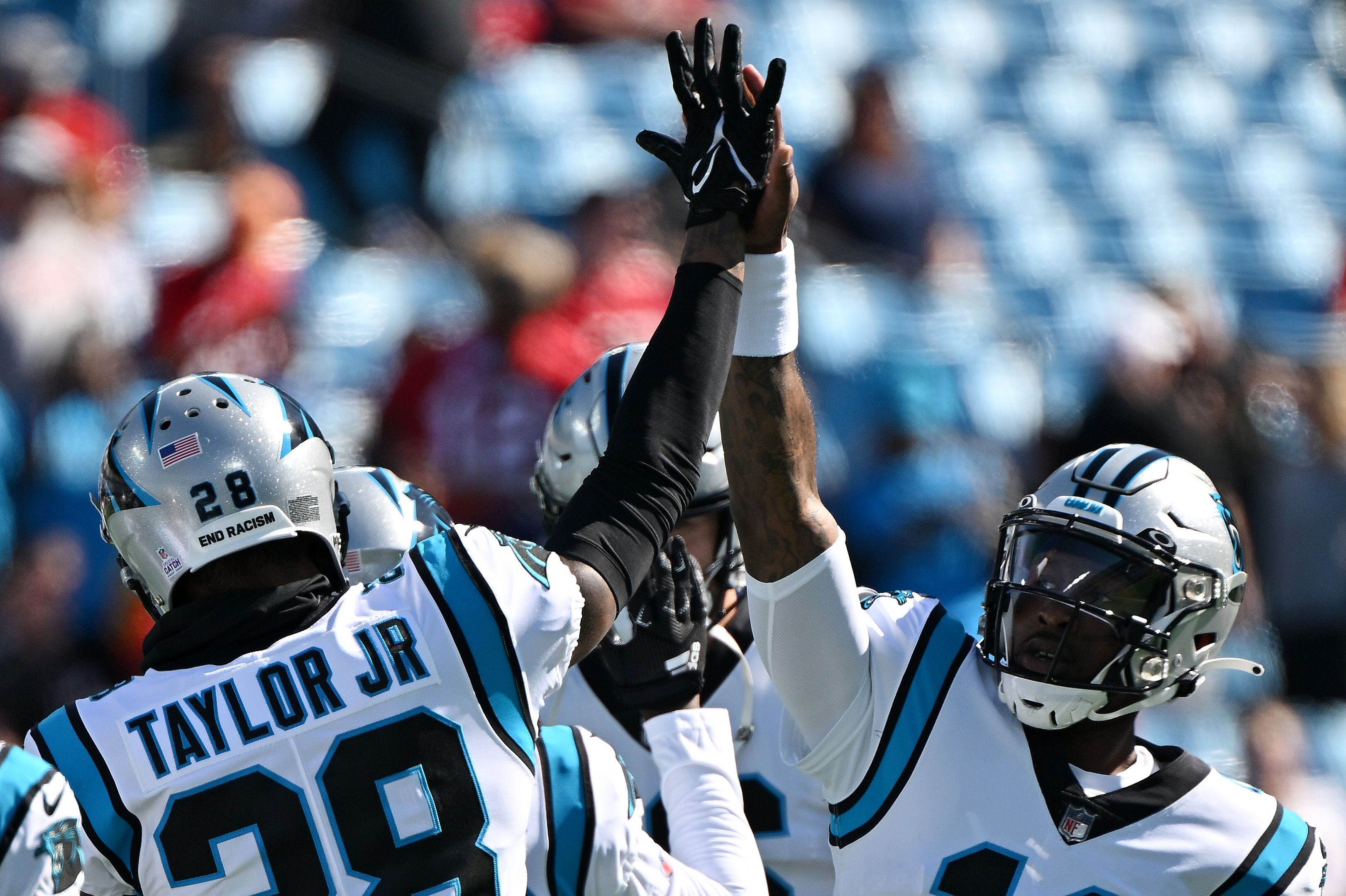 Carolina Panthers running back Chuba Hubbard (30) takes a handoff from  quarterback PJ Walker (11) during an NFL football game against the Tampa  Bay Buccaneers on Sunday, Oct. 23, 2022, in Charlotte