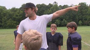 PHOTOS: Greg Olsen, Luke Kuechly coach youth football team at halftime