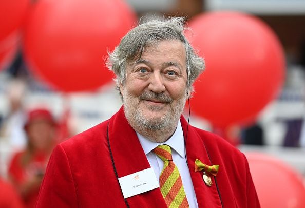 Stephen Fry falls six feet off stage, taken to hospital for