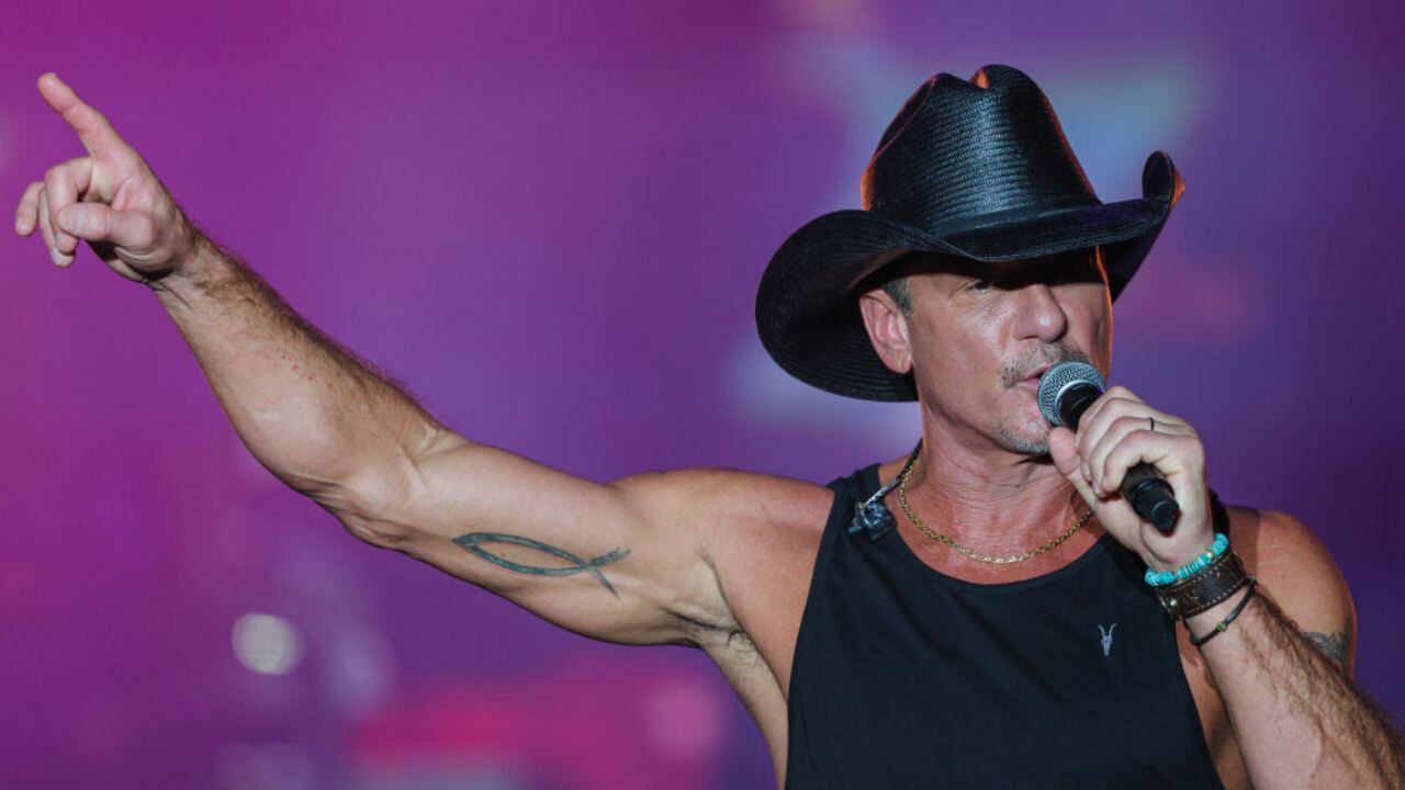 Tim McGraw Sports His Father's Phillies Jersey While Attending