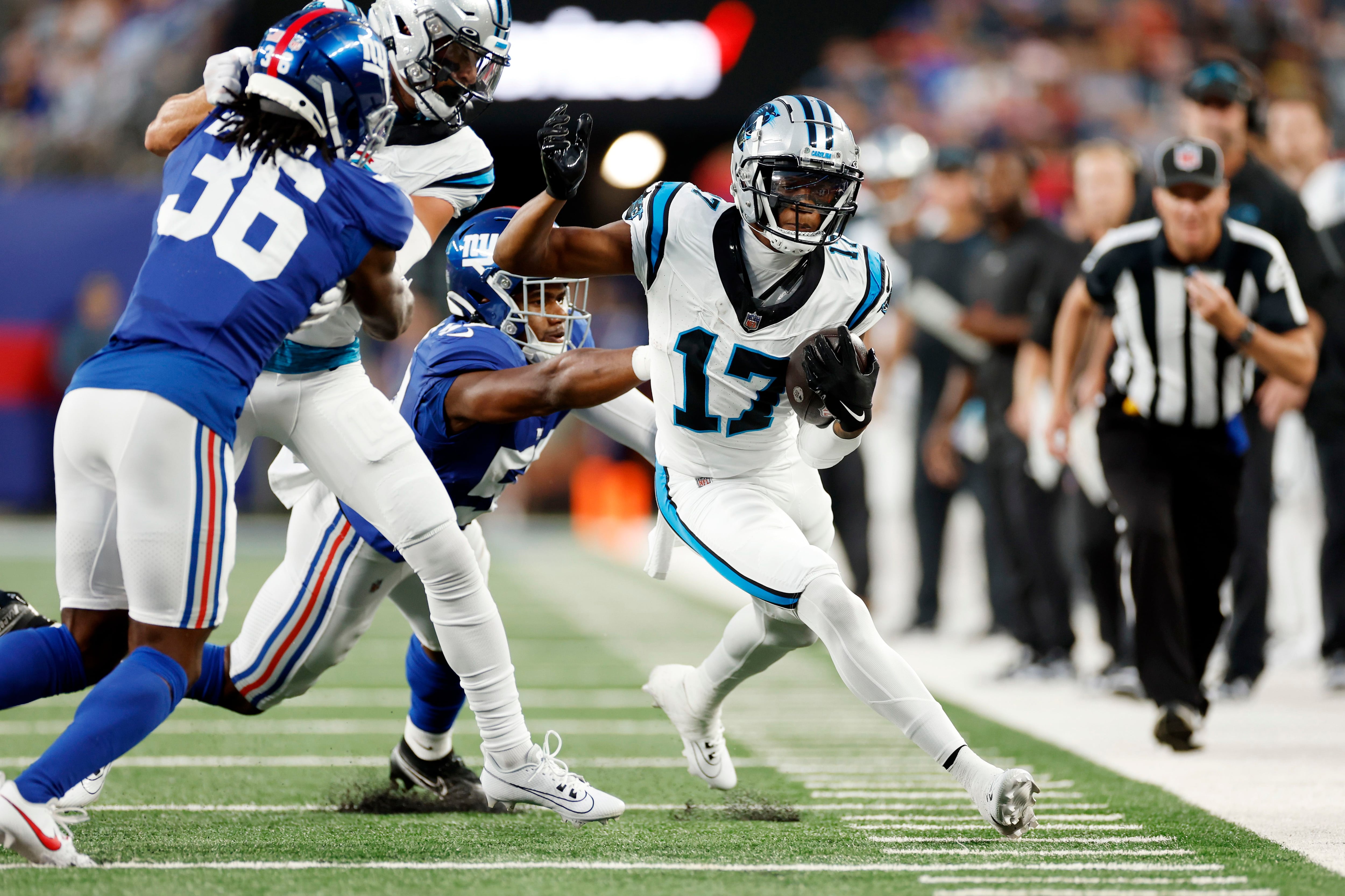 Carolina Panthers running back Camerun Peoples (32) warms up before an NFL  pre-season football game against the New York Giants on Friday, Aug. 18,  2023, in East Rutherford, N.J. (AP Photo/Rusty Jones